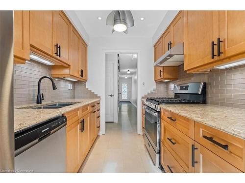 5160 Silvercreek Drive, Burlington, ON - Indoor Photo Showing Kitchen With Double Sink