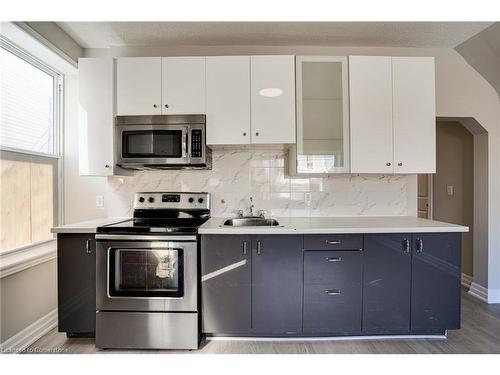 Main-1164 Cannon Street E, Hamilton, ON - Indoor Photo Showing Kitchen With Stainless Steel Kitchen