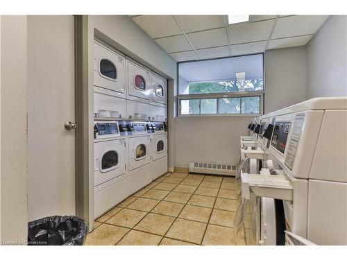 1603-150 Charlton Avenue E, Hamilton, ON - Indoor Photo Showing Laundry Room