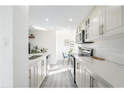 1403-30 Malta Avenue, Brampton, ON - Indoor Photo Showing Kitchen With Double Sink