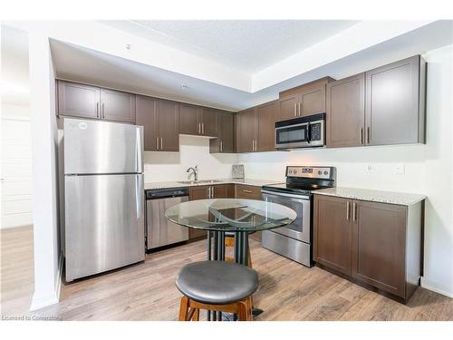 Ll14-25 Kay Cres Crescent, Guelph, ON - Indoor Photo Showing Kitchen With Stainless Steel Kitchen With Double Sink