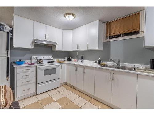 830 Stonegate Drive, Woodstock, ON - Indoor Photo Showing Kitchen With Double Sink