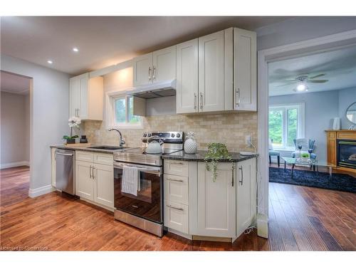 48 Westmount Road S, Waterloo, ON - Indoor Photo Showing Kitchen With Fireplace With Upgraded Kitchen