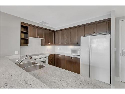 1209-1665 The Collegeway, Mississauga, ON - Indoor Photo Showing Kitchen With Double Sink