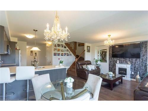 3 Cooke Avenue, Brantford, ON - Indoor Photo Showing Dining Room With Fireplace