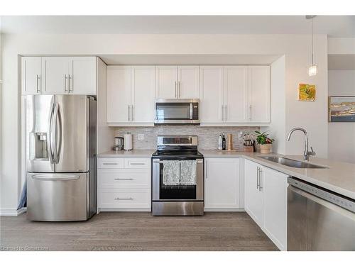 94-1890 Rymal Road E, Hamilton, ON - Indoor Photo Showing Kitchen With Stainless Steel Kitchen With Double Sink