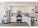 94-1890 Rymal Road E, Hamilton, ON  - Indoor Photo Showing Kitchen With Stainless Steel Kitchen With Double Sink 