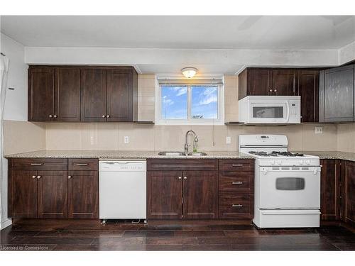 18 Pearl Street, Tilbury, ON - Indoor Photo Showing Kitchen With Double Sink