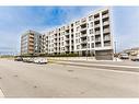 407-1440 Clarriage Court, Milton, ON  - Outdoor With Balcony With Facade 