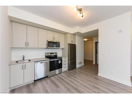 407-1440 Clarriage Court, Milton, ON - Indoor Photo Showing Kitchen With Stainless Steel Kitchen