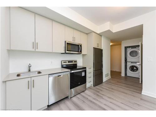 407-1440 Clarriage Court, Milton, ON - Indoor Photo Showing Kitchen With Stainless Steel Kitchen