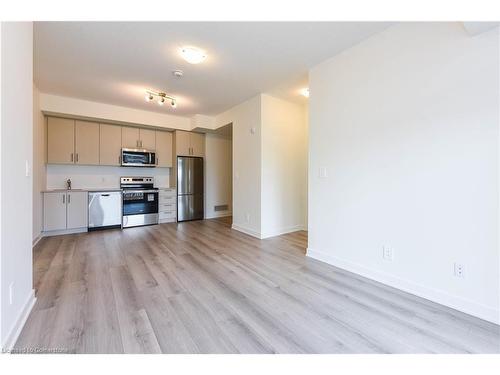 407-1440 Clarriage Court, Milton, ON - Indoor Photo Showing Kitchen With Stainless Steel Kitchen