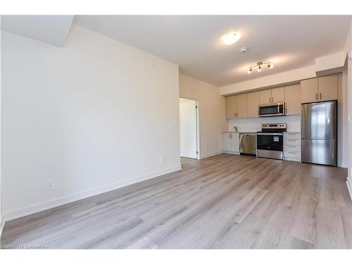 407-1440 Clarriage Court, Milton, ON - Indoor Photo Showing Kitchen With Stainless Steel Kitchen