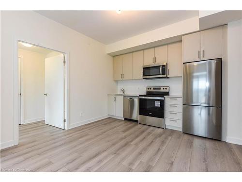 407-1440 Clarriage Court, Milton, ON - Indoor Photo Showing Kitchen With Stainless Steel Kitchen