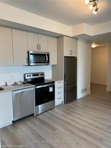 407-1440 Clarriage Court, Milton, ON - Indoor Photo Showing Kitchen With Stainless Steel Kitchen