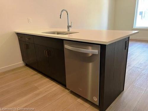 70-405 Myers Road, Cambridge, ON - Indoor Photo Showing Kitchen With Double Sink