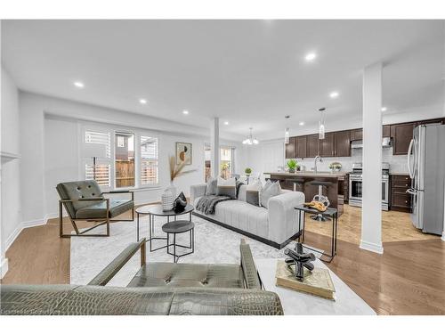 8412 Eva Boulevard, Niagara Falls, ON - Indoor Photo Showing Living Room With Fireplace