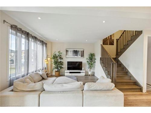 176 Whithorn Crescent Crescent, Caledonia, ON - Indoor Photo Showing Living Room With Fireplace