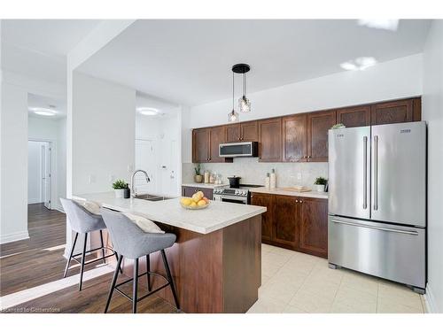 105-5070 Fairview Street, Burlington, ON - Indoor Photo Showing Kitchen With Stainless Steel Kitchen