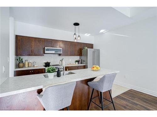 105-5070 Fairview Street, Burlington, ON - Indoor Photo Showing Kitchen With Stainless Steel Kitchen