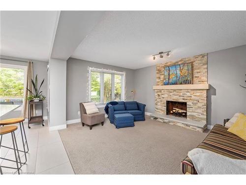 67 Robinson Lane, London, ON - Indoor Photo Showing Living Room With Fireplace