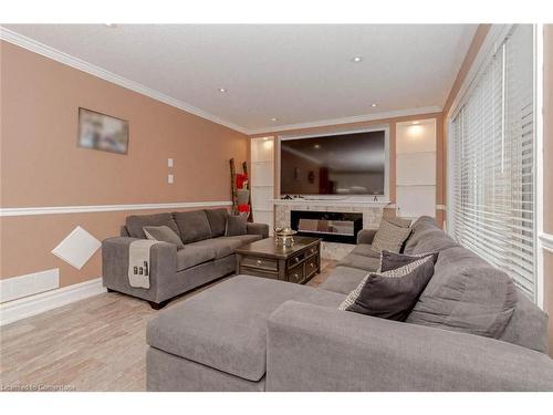 22 Mcintyre Lane Lane, Grand Valley, ON - Indoor Photo Showing Living Room With Fireplace