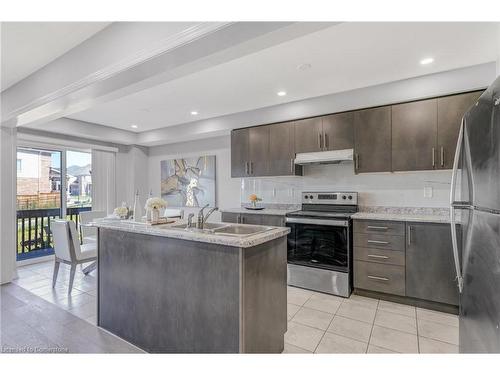 4-740 Linden Drive, Cambridge, ON - Indoor Photo Showing Kitchen With Double Sink