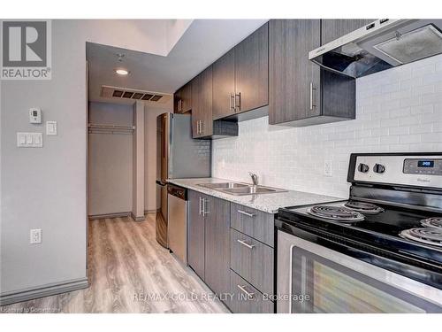 G304-275 Larch Street, Waterloo, ON - Indoor Photo Showing Kitchen With Double Sink