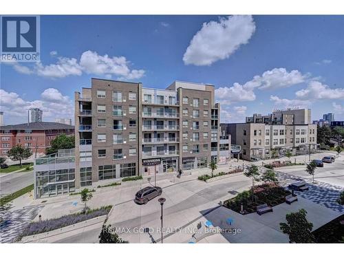 G304-275 Larch Street, Waterloo, ON - Outdoor With Facade