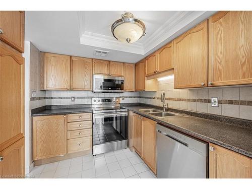 803-350 Webb Drive, Mississauga, ON - Indoor Photo Showing Kitchen With Double Sink