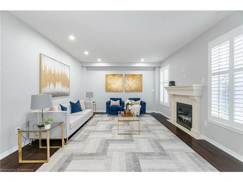 16 Burgess Crescent, Brantford, ON - Indoor Photo Showing Living Room With Fireplace