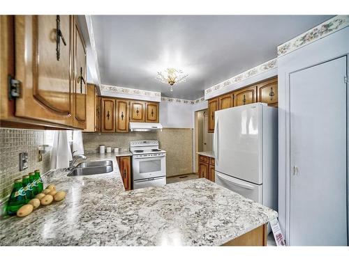 211 Cherry Post Drive, Peel, ON - Indoor Photo Showing Kitchen With Double Sink