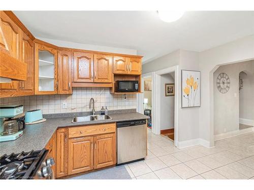 62 East 14Th Street, Hamilton, ON - Indoor Photo Showing Kitchen With Double Sink