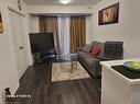 100-6705 Cropp Street, Niagara Falls, ON  - Indoor Photo Showing Living Room 