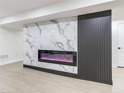 47 Alderney Avenue, Hamilton, ON - Indoor Photo Showing Living Room With Fireplace