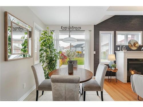 82 Latimer Avenue Avenue, Angus, ON - Indoor Photo Showing Dining Room With Fireplace