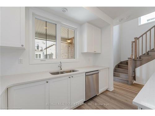 75-1317 Leriche Way, Milton, ON - Indoor Photo Showing Kitchen With Double Sink