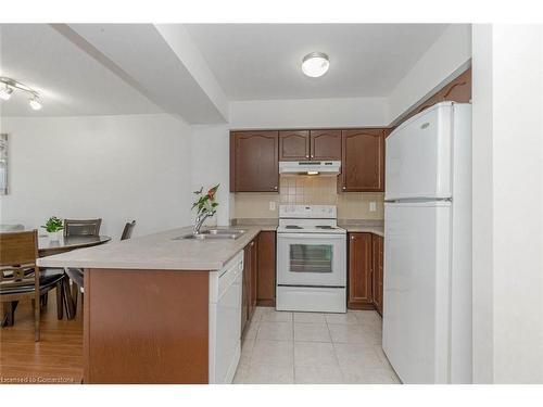 1002-220 Forum Drive, Mississauga, ON - Indoor Photo Showing Kitchen With Double Sink