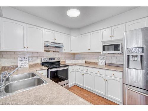 76 Gibbons Drive, Fergus, ON - Indoor Photo Showing Kitchen With Double Sink