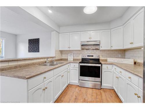 76 Gibbons Drive, Fergus, ON - Indoor Photo Showing Kitchen With Double Sink