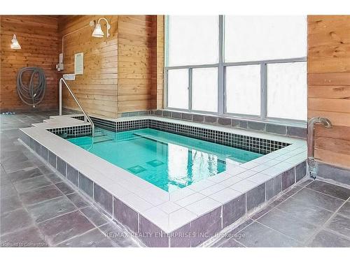 711-2177 Burnhamthorpe Road W, Mississauga, ON - Indoor Photo Showing Other Room With In Ground Pool