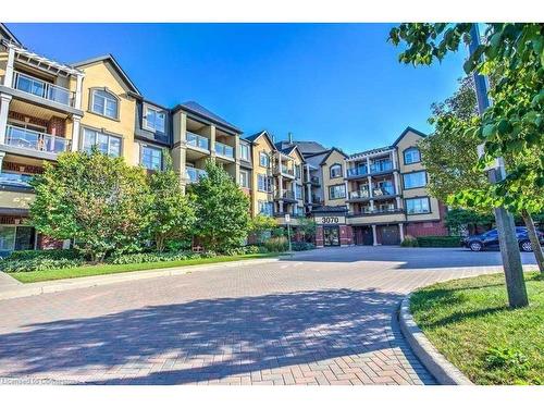 316-3070 Rotary Way, Halton, ON - Outdoor With Balcony With Facade