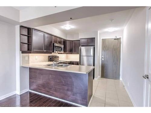 316-3070 Rotary Way, Halton, ON - Indoor Photo Showing Kitchen With Stainless Steel Kitchen With Double Sink