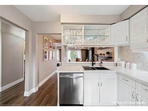 112-2149 Mountain Grove Avenue, Burlington, ON - Indoor Photo Showing Kitchen With Double Sink