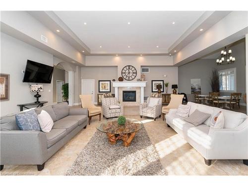 1440 Main St Street E, Milton, ON - Indoor Photo Showing Living Room With Fireplace