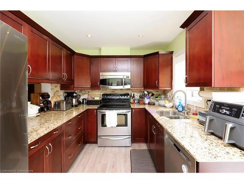 26 Wimbledon Court, Brampton, ON - Indoor Photo Showing Kitchen With Double Sink