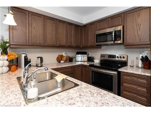 540 Bellflower Court, Milton, ON - Indoor Photo Showing Kitchen With Stainless Steel Kitchen With Double Sink