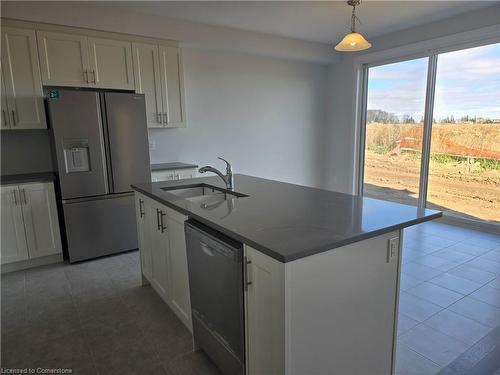 901 Knights Lane, Woodstock, ON - Indoor Photo Showing Kitchen With Double Sink