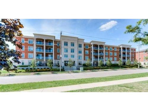 301-175 Commonwealth Street, Kitchener, ON - Outdoor With Balcony With Facade