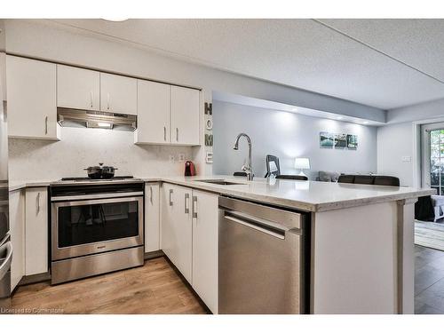 103-1460 Bishops Gate, Oakville, ON - Indoor Photo Showing Kitchen With Stainless Steel Kitchen With Upgraded Kitchen